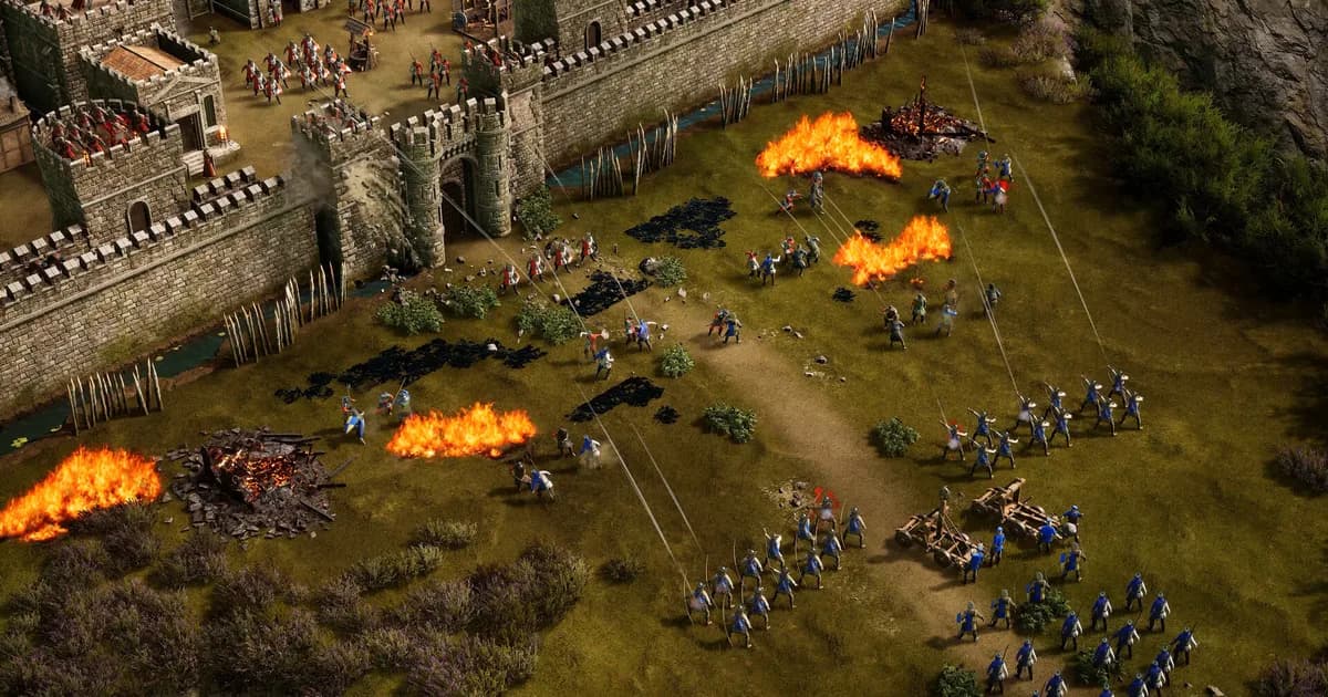 Blue-clad archers and catapults advance on a stone gatehouse while pitch fires burn in the grass below the walls