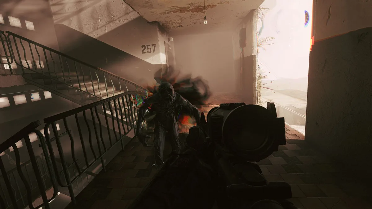 First-person view of a twisted, smoking creature charging down a concrete stairwell toward the player's scoped rifle