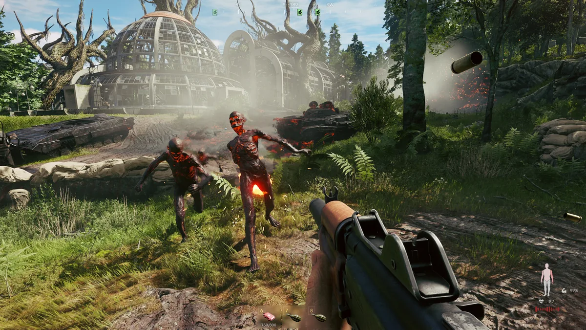 Two glowing red creatures transformed by active matter charge toward the player near an overgrown domed greenhouse structure and abandoned military vehicles