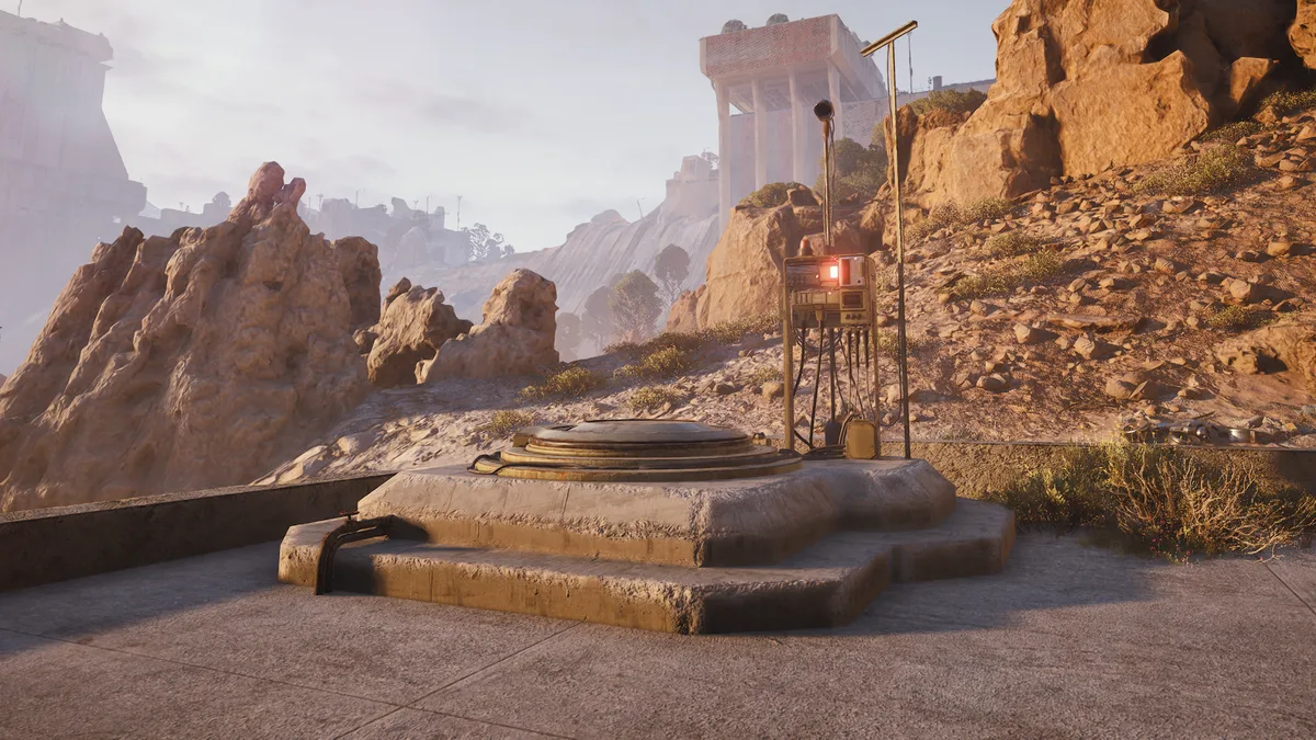 An ARC Raiders Raider Hatch, a round metal hatch on a stone platform beside a lit signal post, in a rocky desert