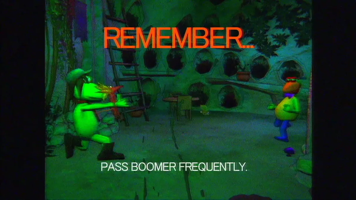 A green puppet hands a small spiky red creature to a teammate in a jungle room, caption card reading Remember, pass Boomer frequently