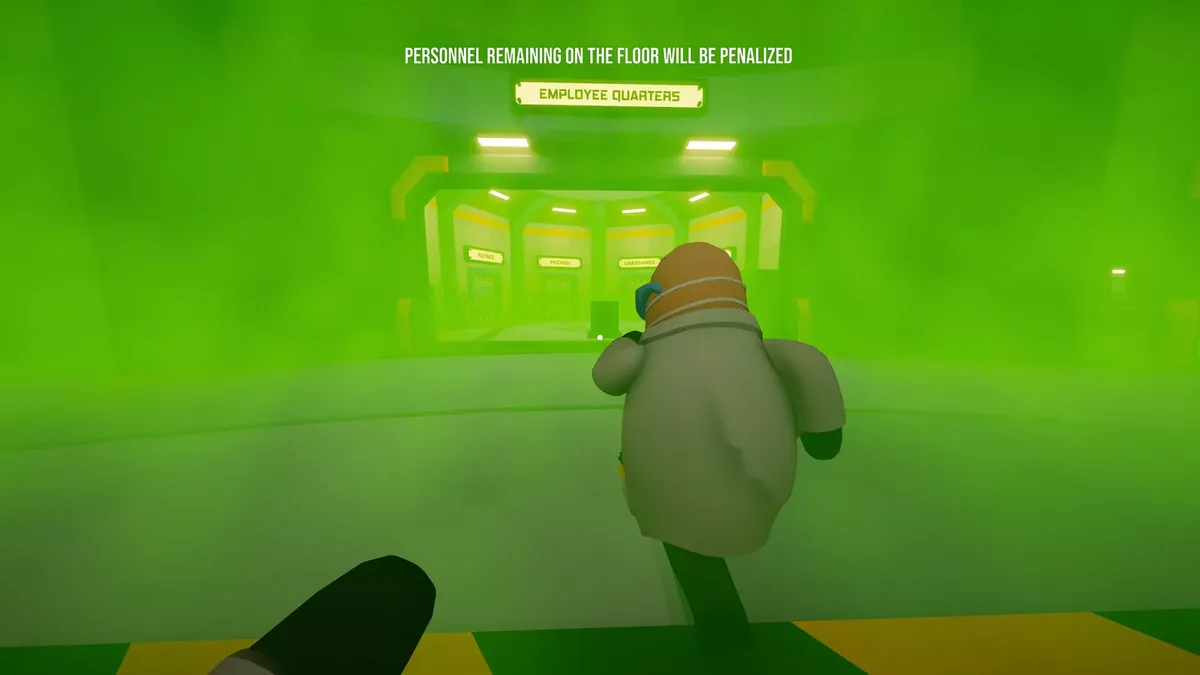 Worker runs through a hallway flooded with green gas under a warning that personnel remaining on the floor will be penalized