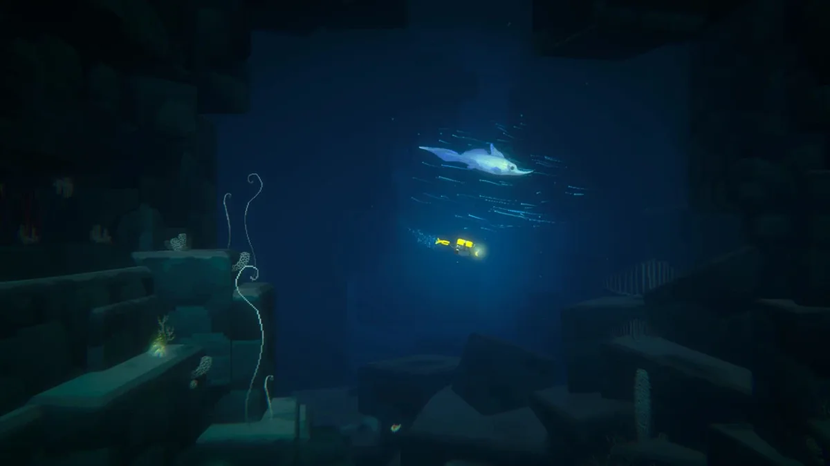 Dave swims through a dark deep-sea trench while a pale long-billed fish glides overhead in the beam of his flashlight