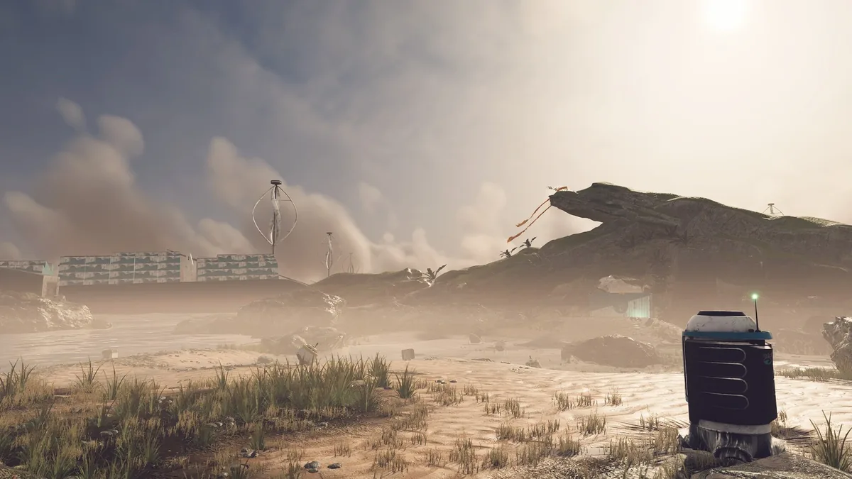 Wide misty coastline in Distant Shore with a wind turbine, grassy outcrops, and scattered structures under a hazy sun