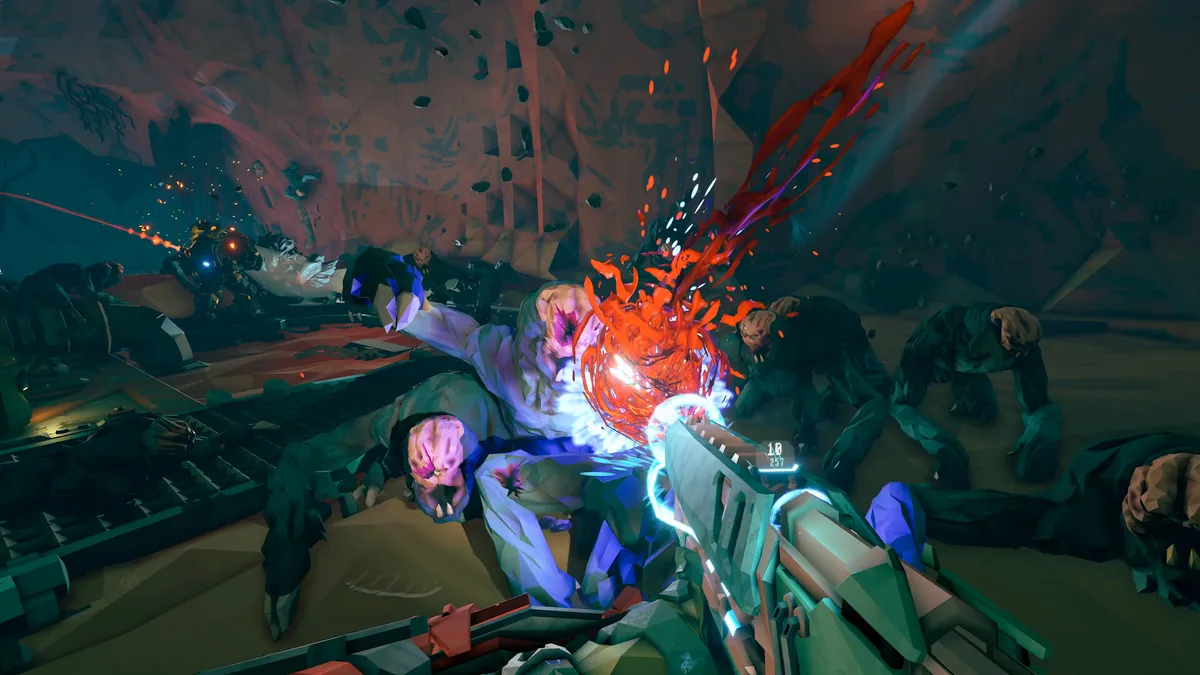 A first-person combat scene showing a weapon firing at a wounded pale creature amid multiple enemies in a dark tunnel
