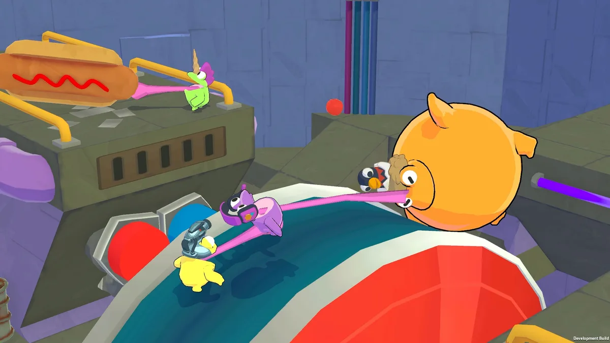 A purple frog using its tongue to grab a large round orange food item while yellow and teal frogs position nearby for a relay handoff