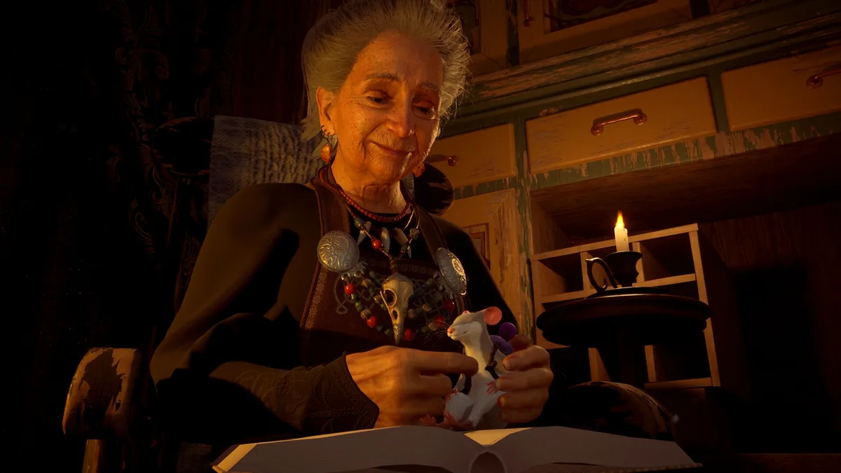 The white-haired witch smiles at a white mouse in her hands by candlelight, an open book on the table