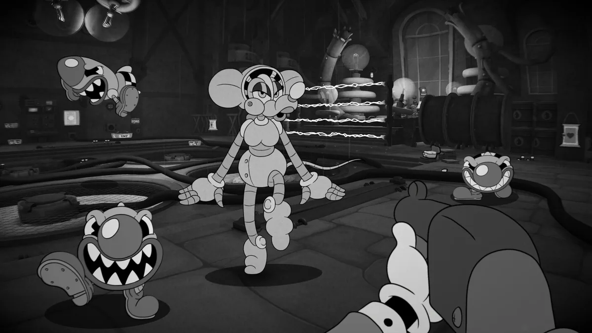 First-person view wielding a shotgun-style weapon against a robotic mouse enemy with electrical effects, surrounded by smaller toothy enemies and TNT crates in an industrial factory setting, black-and-white cartoon art style