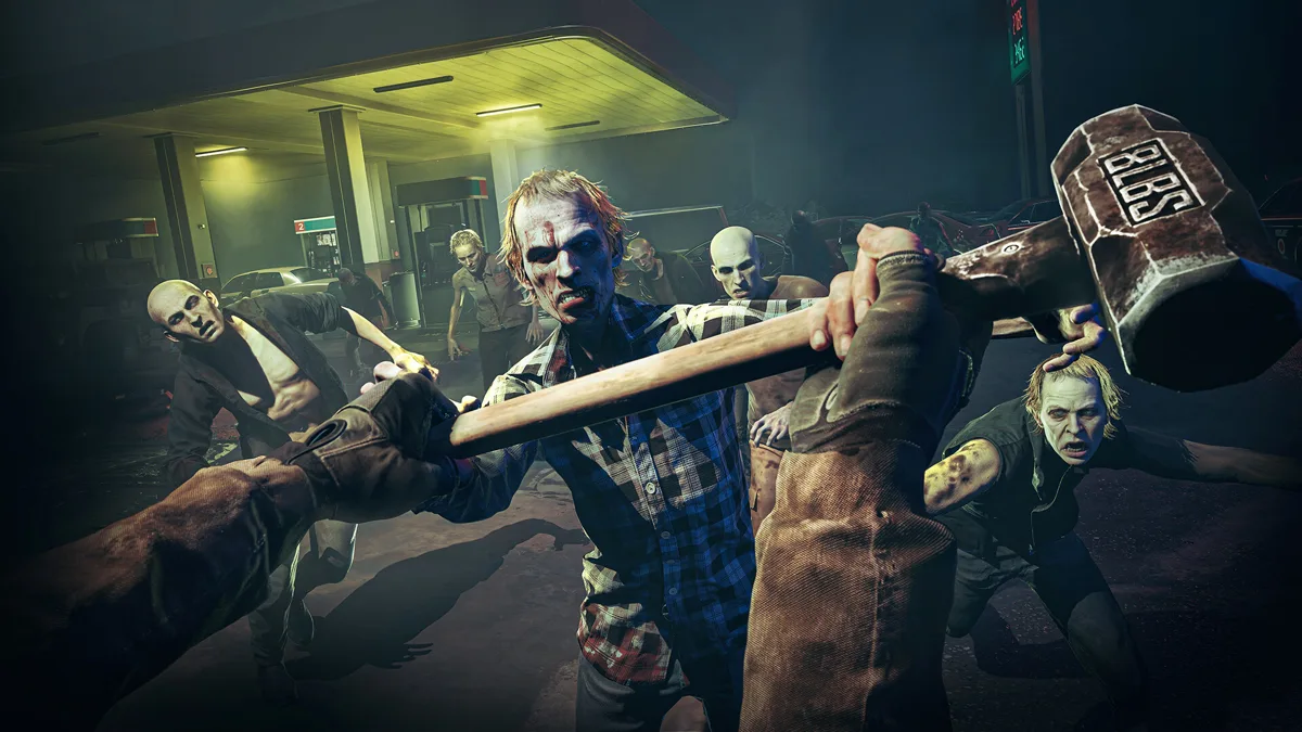 First-person Responder swings a sledgehammer at a plaid-shirted zombie as more close in under a lit gas station canopy