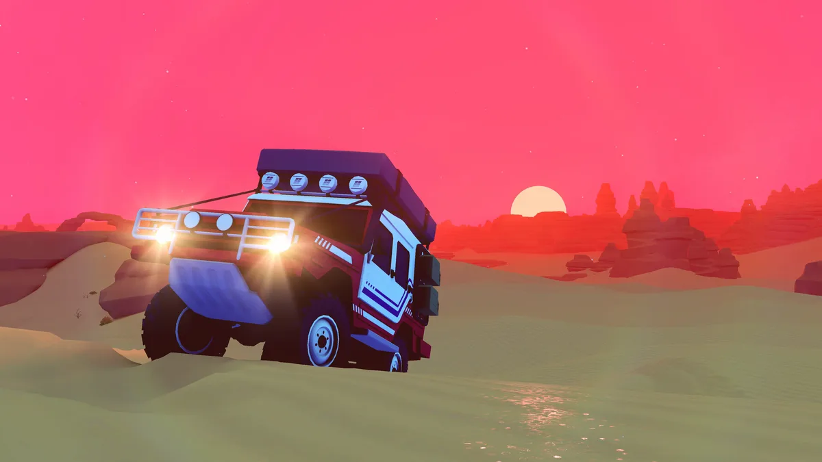 A camper truck with a roof box and lights on its bull bar drives through shallow water at a red desert sunset