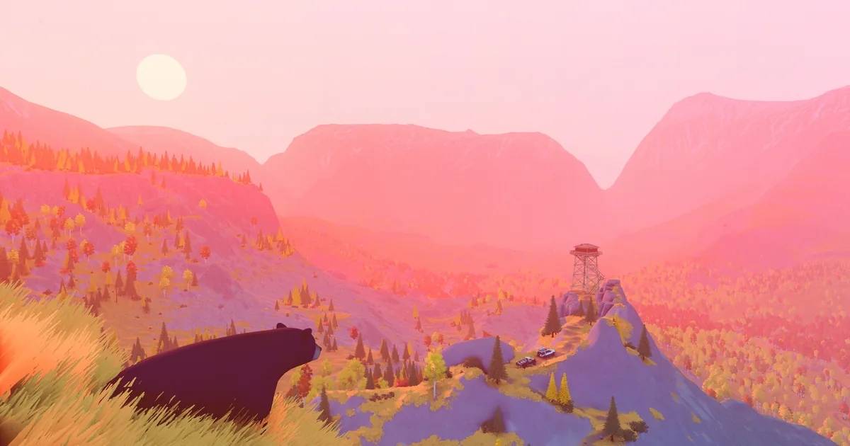Two off-road vehicles follow a ridge road across a pink mountain valley beside a lookout tower