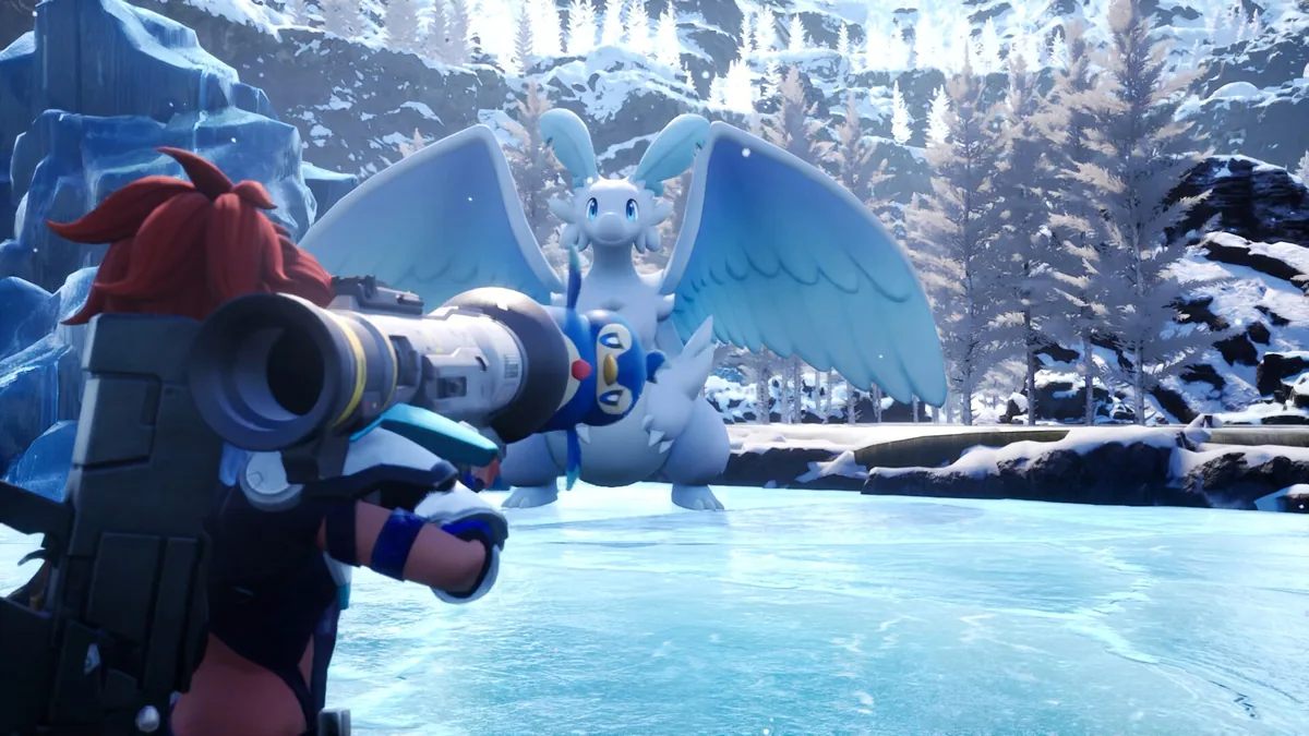 A player aims a heavy launcher at a white and blue winged Pal standing on ice in a snowy pine forest clearing