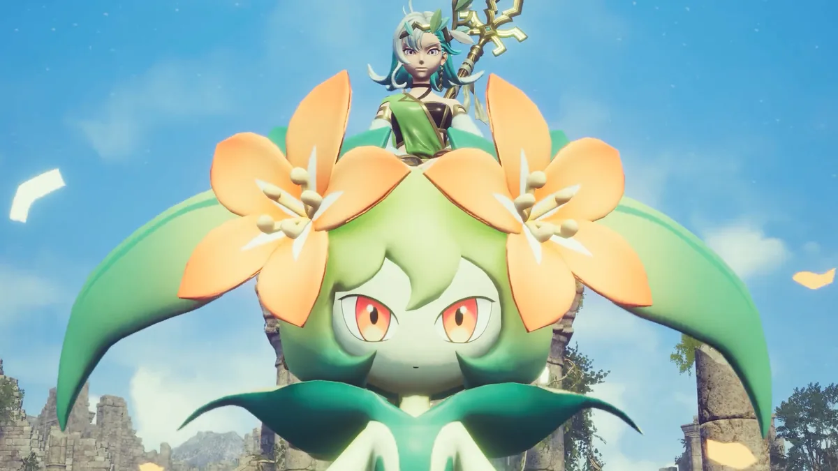 A green flower-crowned Pal with a rider on top stands before pale stone ruins under a blue sky, orange petals drifting around it