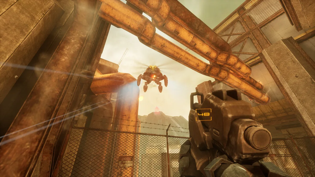 A hovering mechanical drone with yellow lights descends between rusted overhead pipes as FIVE aims a bulky rifle with an ammo readout on its side