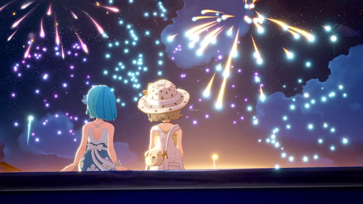Two islanders watch multicolored fireworks over the ocean from a beachside platform