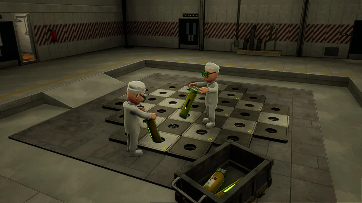 Two reactor workers in white coats and hard hats placing glowing green fuel rods into a floor grid