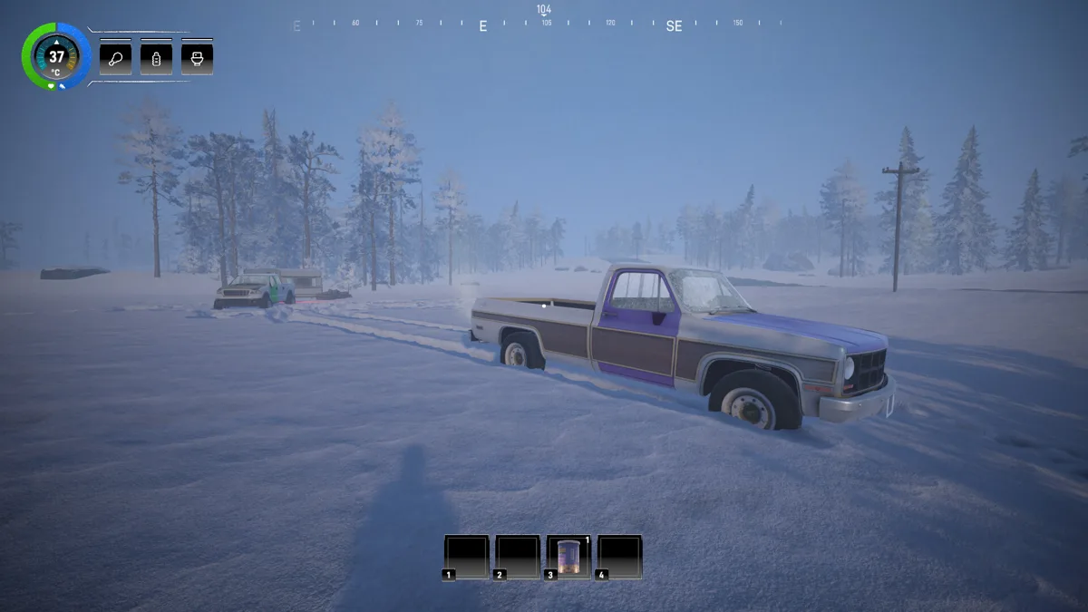Old pickup truck stuck on a snowy road in thick fog, seen in first person
