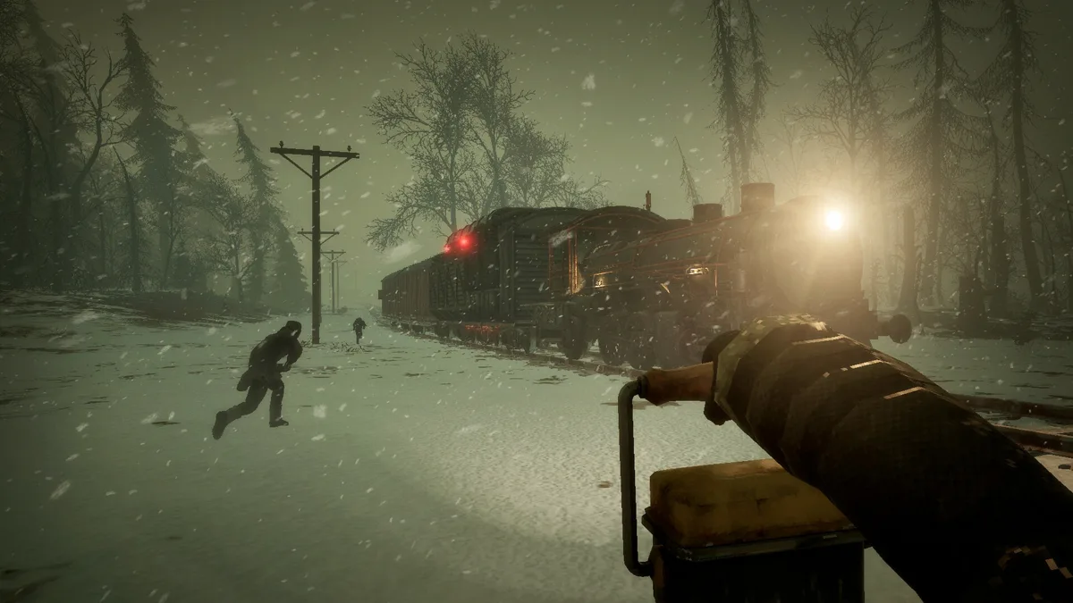 First-person view of a player running through snow beside a steam locomotive with its headlamp lit