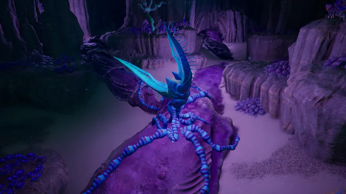 Subnautica 2 juvenile Angel Comb glowing blue in a purple-lit cave, its striped tendrils gripping the rock