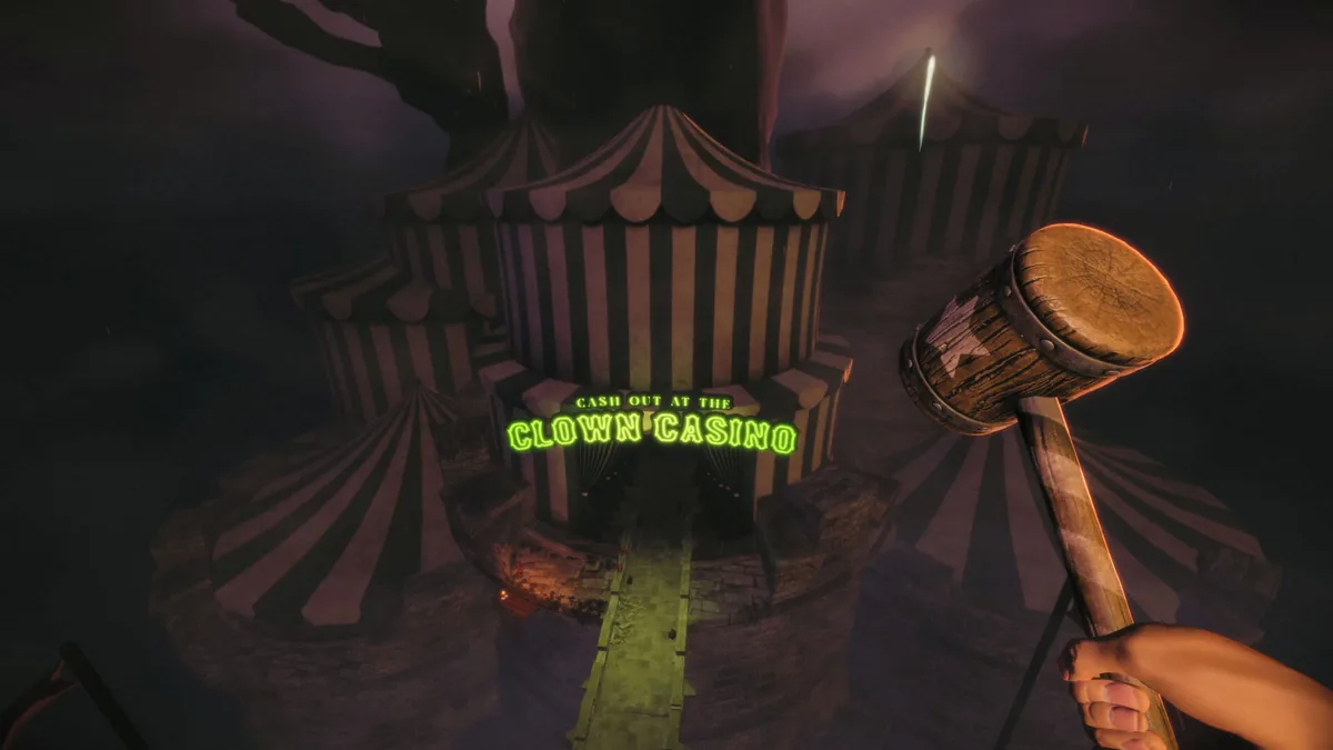 Player wielding the whack-a-mole mallet weapon approaches the neon-lit Clown Casino tent structure inside Twisted Tower's amusement resort
