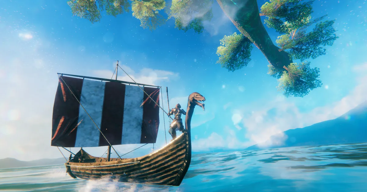 Valheim Deep North biome reveal screenshot showing frozen tundra and towering Norse ruins under a pale overcast sky