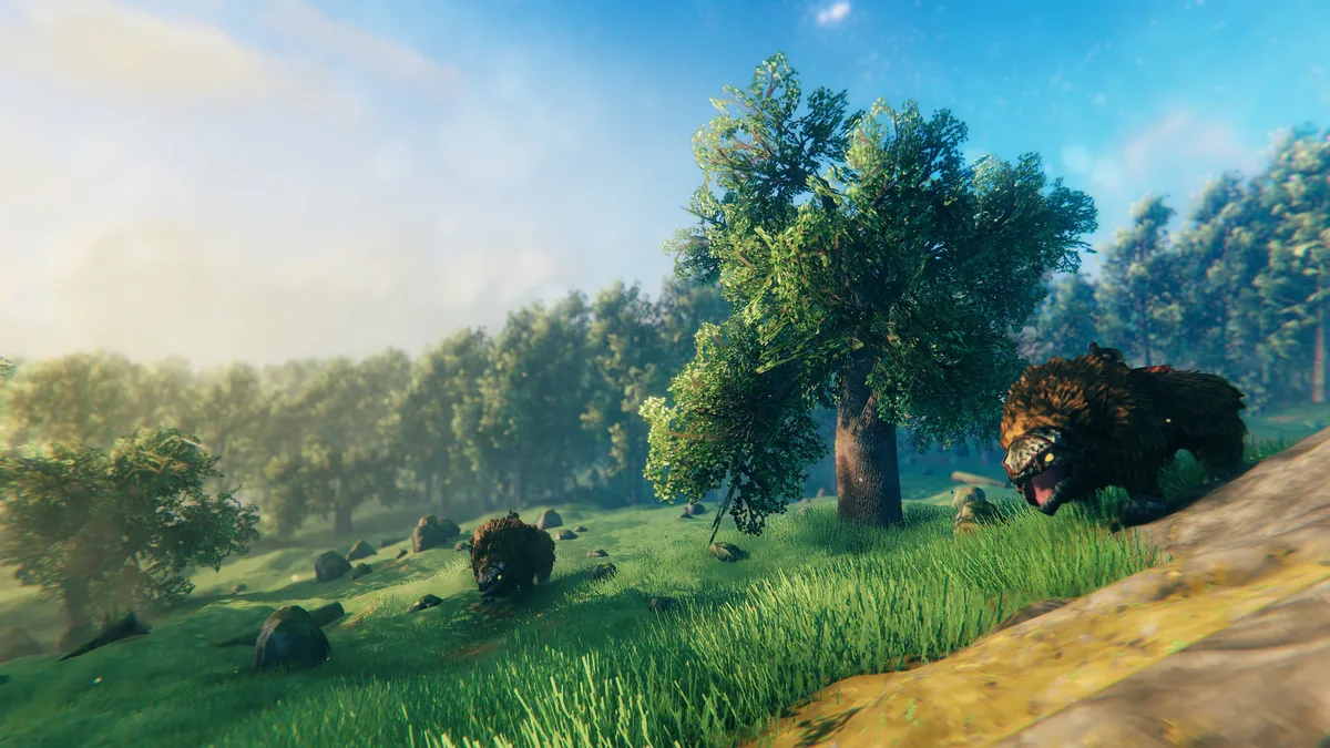 Two boars on a grassy Meadows hillside in Valheim, one wearing armor, near a large tree and scattered rocks