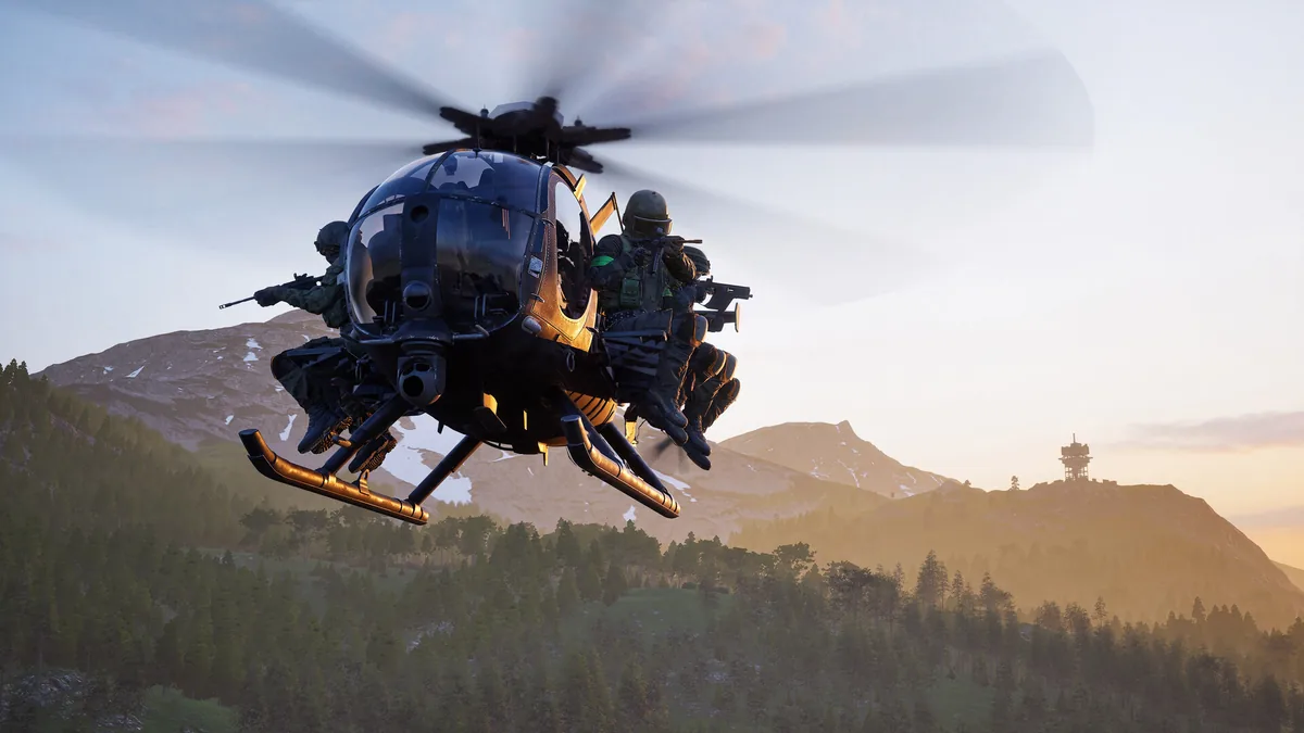 WARDOGS helicopter screenshot showing a squad flying over a forested mountain battlefield