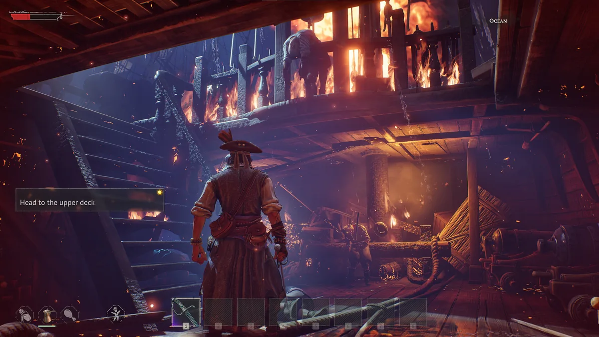 Windrose dark torchlit interior full of fire and hazards with a head to the upper deck prompt, the kind of cramped low-visibility space that punishes poor stamina management