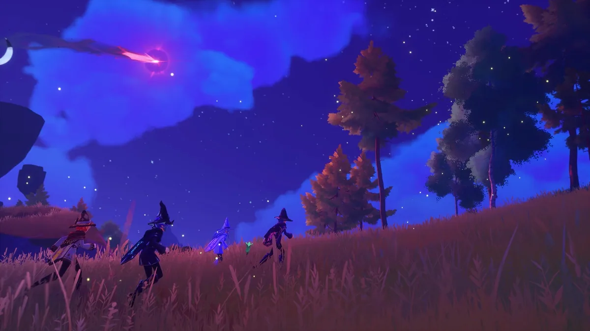 Three witch characters walking through tall grass at night under a shooting star, a small cloaked figure among them